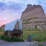 Conestoga covered wagon, Scott Bluff national monument in Nebraska. Nebraska Income Tax Rate