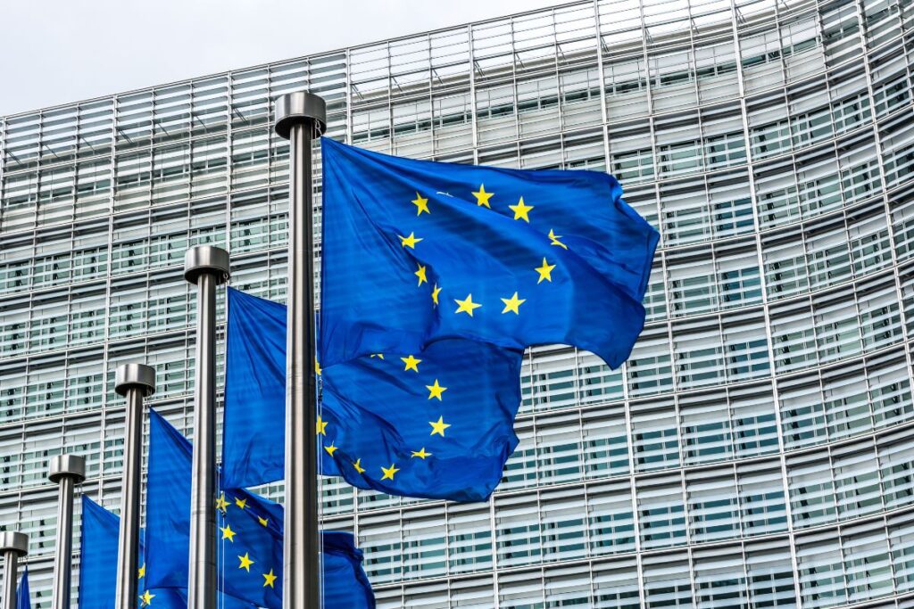 European union flags waving in the end invest in luxembourg