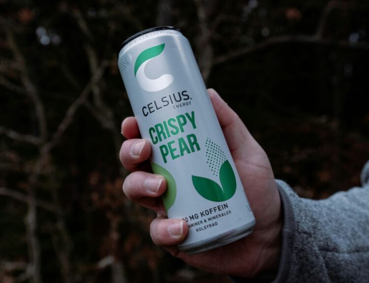 Someone holding Celsius energy drink