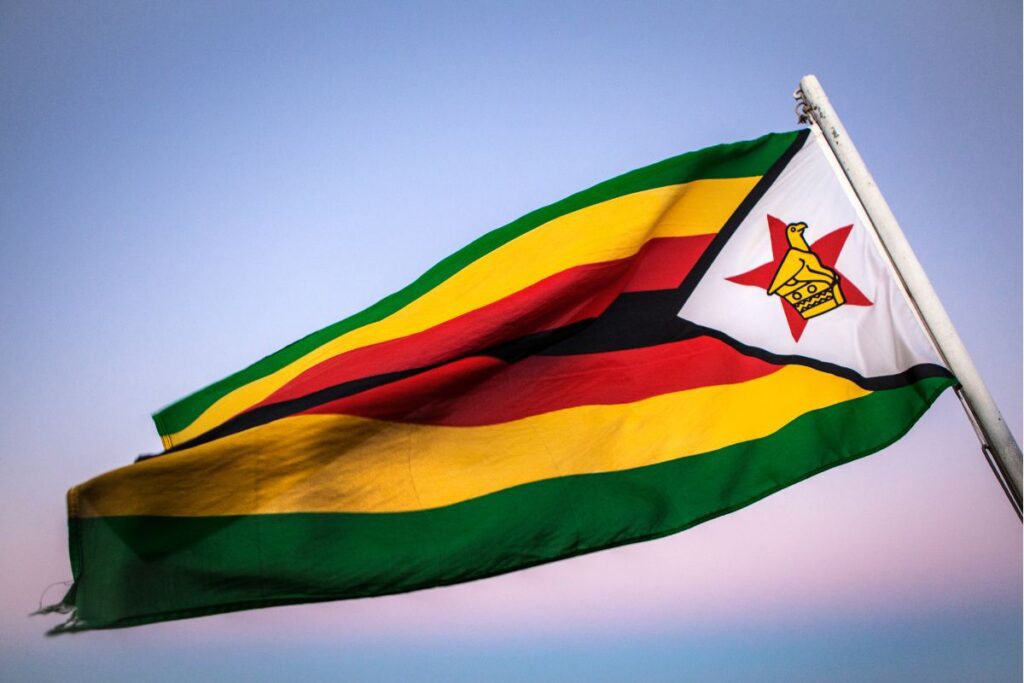 Zimbabwe flag. Richest People in Zimbabwe article