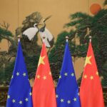 Flags of European Union and China are pictured during the China-EU summit at the Great Hall of the People in Beijing, China, July 12, 2016. REUTERS/Jason Lee/File Photo