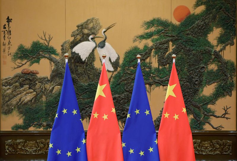 Flags of European Union and China are pictured during the China-EU summit at the Great Hall of the People in Beijing, China, July 12, 2016. REUTERS/Jason Lee/File Photo