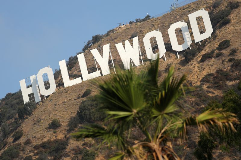 Hollywood workers union reaches pay, AI-use deal with top studios