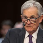 Fed's Powell: 'No hurry' to cut rates amid Trump volatility