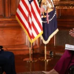 Trump downplays recession fears, saying the US would be 'OK' in the long term