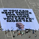 “If You Can Rent Venice, You Can Pay More Tax”: Protesters Target Jeff Bezos