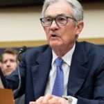 Powell Reaffirms Inflation Fight, Says Fed Will ‘Wait and See’ on Tariff Impact