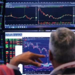 Global Rally Stalls in Asia, But Wall Street Futures Hold Gain