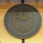 Fed approves quarter-point interest rate cut and sees two more coming this year