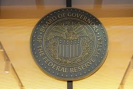 Fed approves quarter-point interest rate cut and sees two more coming this year