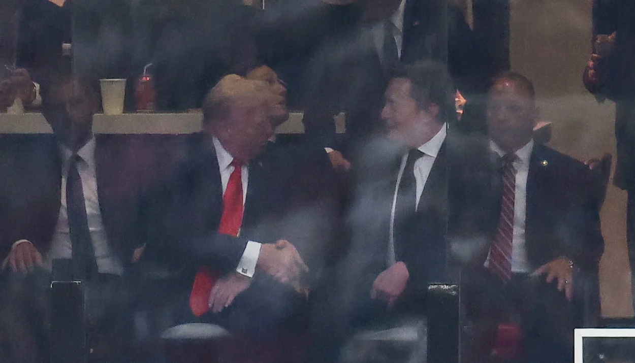 Musk and Trump shake hands