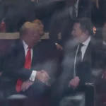 Musk and Trump shake hands