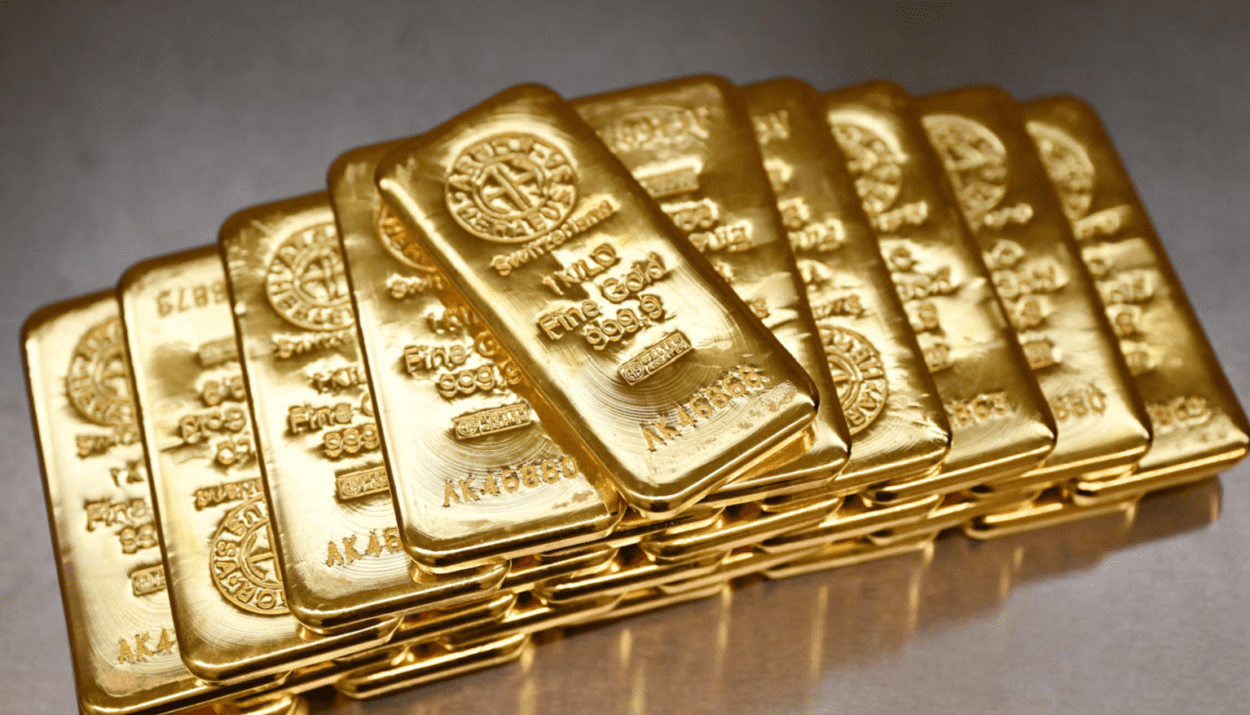Gold leaps to record high, dollar drops as US prosecutors target Fed's Powell