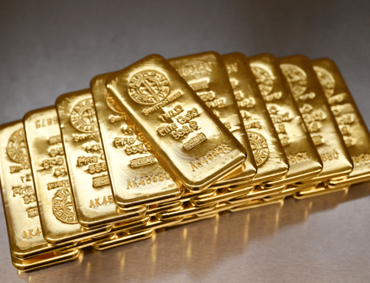 Gold leaps to record high, dollar drops as US prosecutors target Fed's Powell