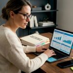 Person researching investment taxes at home desk