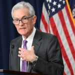 Fed Holds Rates Steady, Signals Inflation Fight Isn't Over