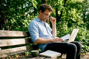 Economist studying behavioral economics at desk