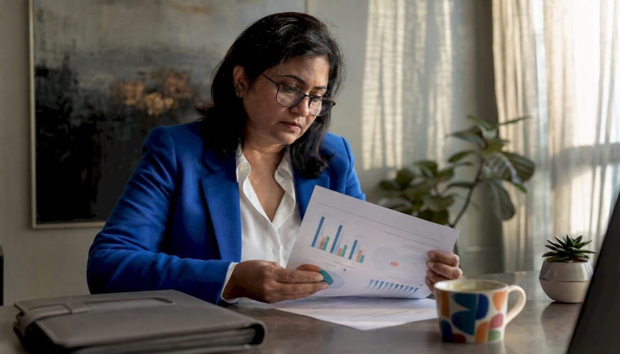 Investor reviewing diversified portfolio papers