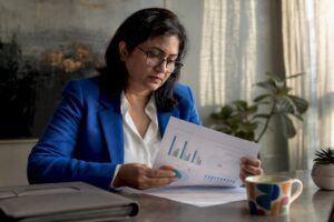 Investor reviewing diversified portfolio papers