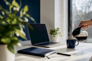 Pouring coffee in home workspace
