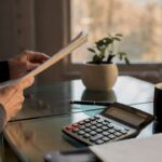 Close-up of financial planning objects on desk