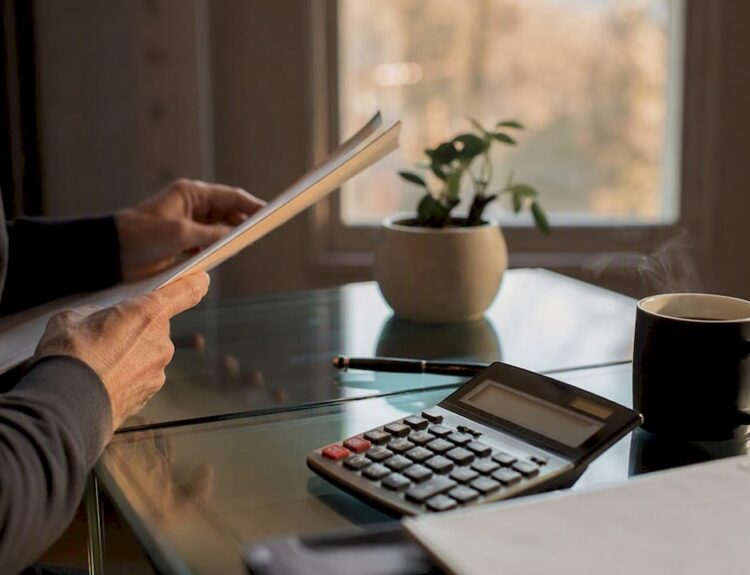 Close-up of financial planning objects on desk