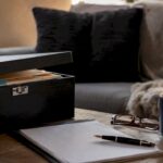 Legal document box and pen on table