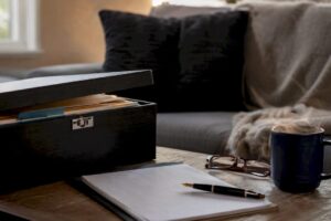Legal document box and pen on table